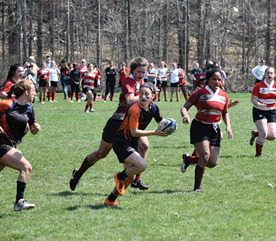 Lindsay playing rugby