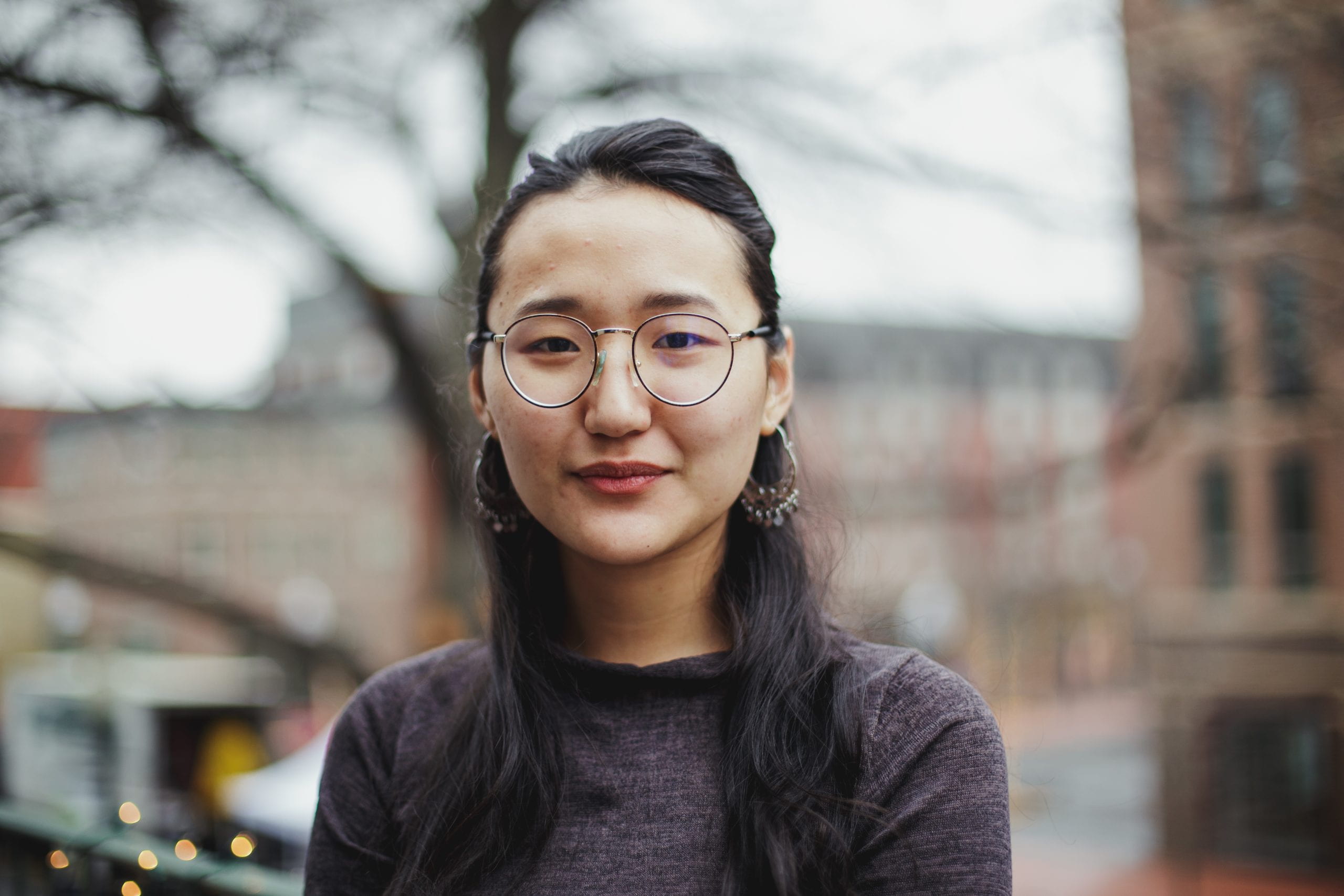 young woman with glasses