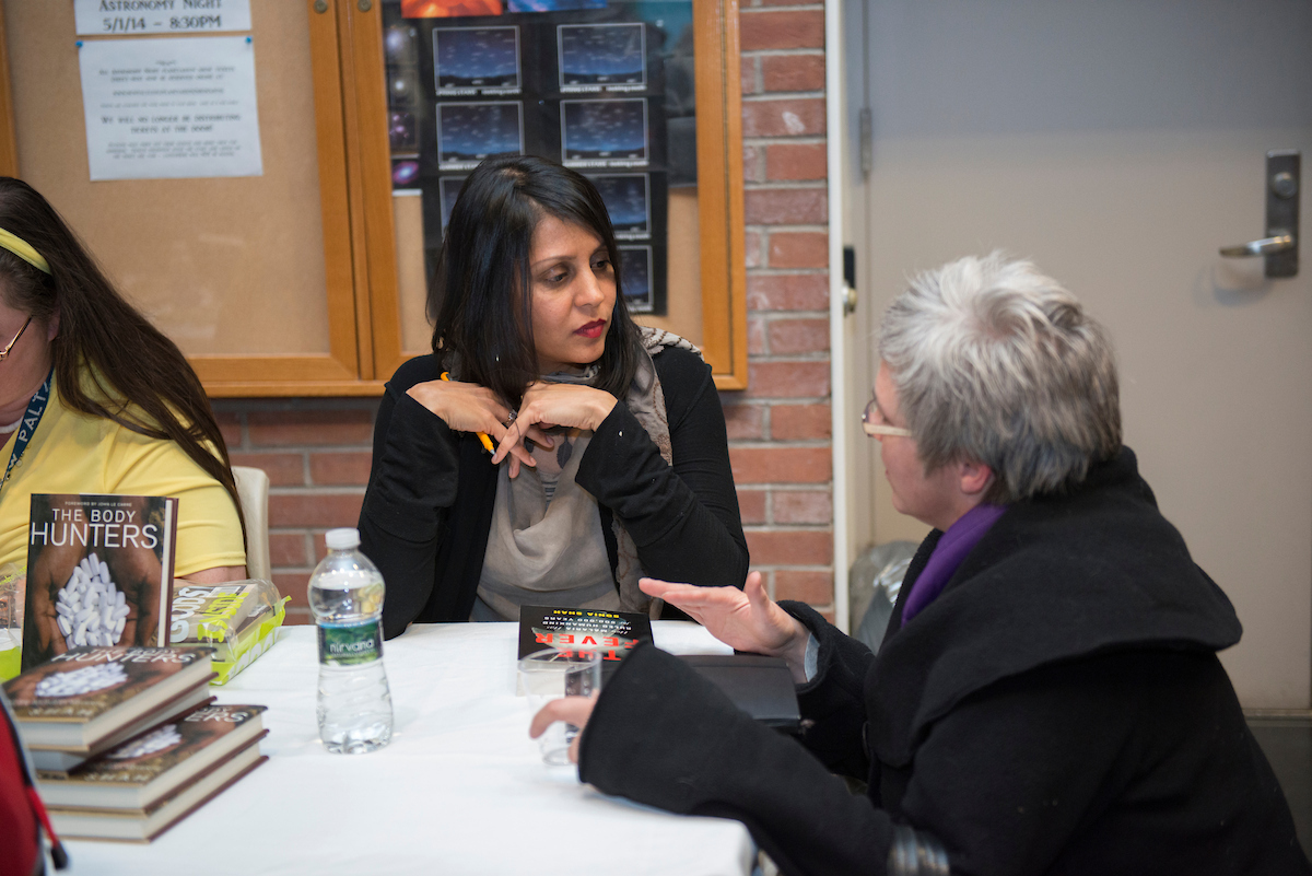 Ottaway talking to student